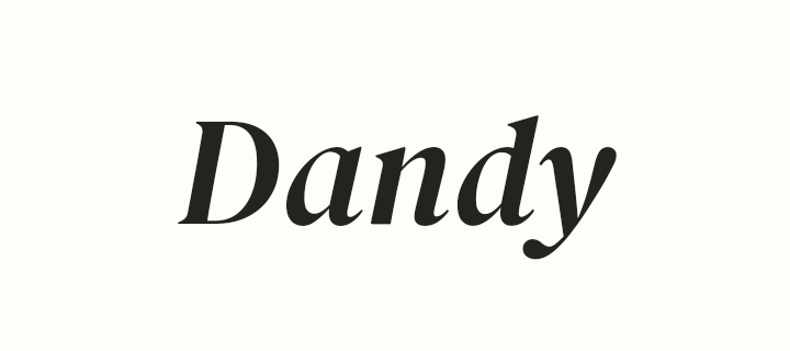 밝은 배경 위에 진한 색으로 쓴 연습용 Dandy 글자